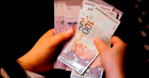 Ringgit opens slightly higher against US dollar amid higher DXY