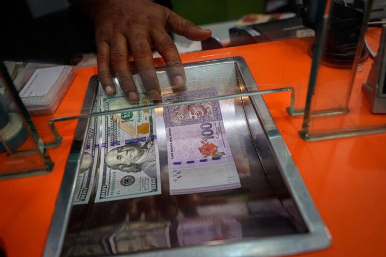 Ringgit opens higher against US dollar